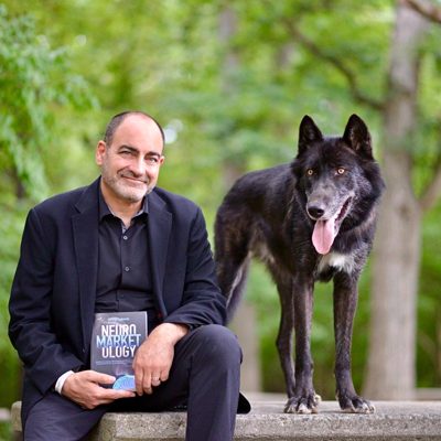 Brian Fabiano outdoors with his book Neuromarketology and his dog